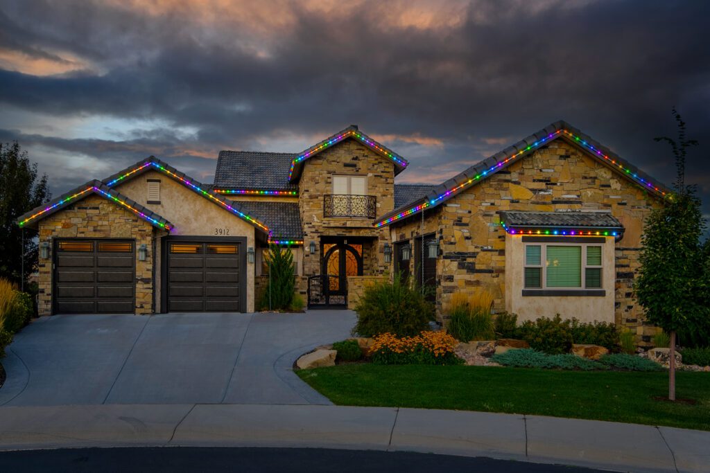 A stunning residential holiday lighting install of OELO brand permanent lights