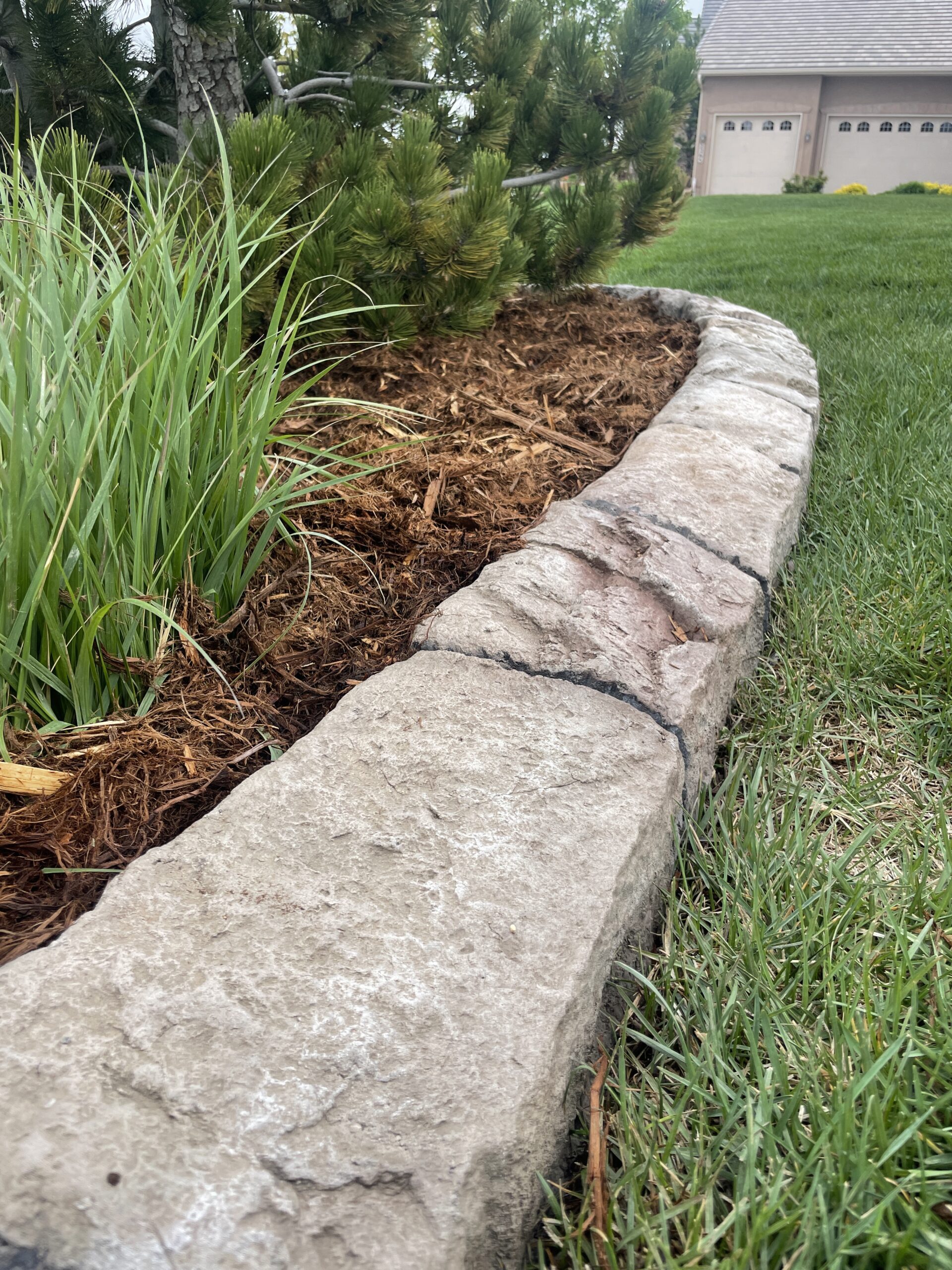 Concrete lawn edging case study for townhouse complex in Colorado Springs, CO
