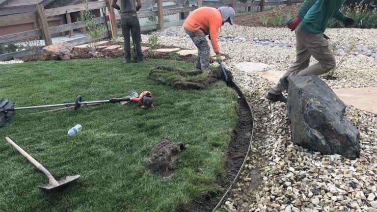 # Is No-Dig Landscape Edging Worth It? A Comprehensive Guide ## Introduction to No-Dig Landscape Solutions As a landscaping professional serving Colorado homeowners for over 15 years, I've witnessed firsthand how the right edging can transform an ordinary yard into a stunning landscape. No-dig landscape edging has revolutionized the way we approach garden borders, creating clean separations between lawn areas, flowerbeds, and hardscapes without the extensive excavation traditionally required. No-dig landscape edging offers a quick, efficient alternative to traditional installation methods, promising a professional finish without disrupting established root systems or requiring heavy equipment. But is it truly worth the investment? Let's explore the advantages, limitations, and cost considerations of this increasingly popular landscape solution. ## What Exactly Is No-Dig Landscape Edging? No-dig landscape edging refers to border materials that can be installed with minimal to no excavation. Unlike traditional edging that may require trenching 6-8 inches deep, no-dig options typically involve: 1. Hammering stakes directly into the ground 2. Securing edging materials to these stakes 3. Creating a clean border without disturbing the underlying soil structure This approach is particularly valuable for protecting established plants, preserving soil ecosystems, and creating immediate visual definition in your landscape. ### Common Types of No-Dig Landscape Edging There are several varieties of no-dig landscape edging available, each with unique characteristics: 1. **Plastic No-Dig Edging**: Affordable and flexible, though typically less durable 2. **Metal No-Dig Edging**: More expensive but offers superior longevity and clean lines 3. **Composite No-Dig Systems**: Combines durability with flexibility 4. **Rubber No-Dig Options**: Recycled materials that offer cushioning and flexibility ## Advantages of No-Dig Landscape Edging ### Time Efficiency The most immediate benefit of no-dig landscape edging is the dramatic reduction in installation time. While traditional edging installation might require several hours or even days depending on the project scope, no-dig solutions can often be completed in a fraction of the time. > "After installing both traditional and no-dig edging systems for over a decade, I've found that no-dig landscape options typically reduce installation time by 60-70% while delivering comparable visual results for most residential applications." - Chad, Owner of A Better Edge ### Plant Protection Traditional edging installation requires significant digging, which can damage root systems of nearby plants and trees. No-dig landscape edging minimizes this risk by requiring only surface-level or shallow stake placement, making it ideal for: - Established gardens with mature plants - Areas near trees with extensive root systems - Sensitive native landscaping ### Soil Structure Preservation Maintaining healthy soil structure is essential for thriving landscapes. No-dig edging helps preserve: - Natural soil layers - Beneficial microorganisms - Water percolation patterns - Existing drainage systems ### Ease of Adjustment Unlike permanent concrete edging, no-dig landscape solutions offer flexibility if you change your mind about the design. This allows for: - Seasonal garden redesigns - Expansion of planting areas - Adjustments as plants mature and grow - Experimentation with different garden layouts ## Considerations Before Choosing No-Dig Landscape Edging While no-dig landscape edging offers numerous benefits, it's important to consider potential limitations before making your decision: ### Soil Type Compatibility Not all soil types are equally suited for no-dig installation methods: | Soil Type | No-Dig Effectiveness | Special Considerations | |-----------|----------------------|------------------------| | Sandy | Moderate to Poor | May require deeper stakes or additional support | | Loamy | Excellent | Ideal for most no-dig systems | | Clay | Good | May be difficult to penetrate initially but offers good holding power | | Rocky | Poor to Challenging | Could prevent proper stake placement | ### Durability Concerns The expected lifespan of no-dig landscape edging varies significantly based on materials: 1. **Plastic no-dig edging**: 1-2 years before maintenance, 2-6 years before replacement 2. **Metal no-dig edging**: 3-6 years before maintenance, 10-20 years before replacement 3. **Composite no-dig systems**: 2-4 years before maintenance, 5-15 years before replacement 4. **Rubber no-dig options**: 2-4 years before maintenance, 8-12 years before replacement ### Aesthetic Limitations While no-dig landscape edging can create clean, professional-looking borders, some limitations exist: - Less variety in height options compared to traditional edging - Limited ability to create dramatic level changes - Fewer material choices than dug-in options - Some visibility of stakes or support systems ## Cost Analysis: Is No-Dig Landscape Edging Worth the Investment? When evaluating the value proposition of no-dig landscape edging, it's essential to consider both material and installation costs compared to traditional options: ### Material Cost Comparison | Edging Type | Material Cost (Per Linear Foot) | |-------------|--------------------------------| | Plastic No-Dig | $2-7 | | Metal No-Dig | $6-14 | | Composite No-Dig | $5-12 | | Stone/Brick (Traditional) | $16-70 | | Concrete Curbing (Traditional) | $20-40 | ### Installation Cost Consideration The real cost advantage of no-dig landscape edging often manifests in installation savings: 1. **No-dig landscape edging installation**: $8-16 per linear foot 2. **Traditional landscape edging installation**: $36-100 per linear foot for stone/brick 3. **Concrete curbing installation**: $20-40 per linear foot ### Long-Term Value Assessment When calculating the true value of no-dig landscape edging, consider: 1. **Initial investment**: Combined materials and installation 2. **Maintenance requirements**: Annual upkeep expenses 3. **Replacement frequency**: How often will you need to reinstall? 4. **Landscape Services flexibility**: Does it accommodate future changes? For many homeowners, the lower initial investment of no-dig landscape edging makes it an attractive option, even if replacement is needed more frequently than with some traditional methods. ## Best Applications for No-Dig Landscape Edging No-dig landscape solutions shine in specific applications: ### Garden Bed Definition Creating clean lines between lawn areas and planting beds is perhaps the most common and successful application of no-dig landscape edging. The minimal disturbance allows for: - Immediate visual impact - Protection of existing plants - Easy seasonal adjustments - Clean mowing lines ### Temporary Landscape Design For homeowners considering major landscape overhauls in the future, no-dig landscape edging provides an excellent intermediate solution: 1. Test design concepts before permanent installation 2. Create definition while saving for premium materials 3. Adjust as plants mature to determine optimal layout 4. Implement seasonal design changes ### Rental Property Enhancements For property managers or renters seeking landscape improvements: - Install without permanent property alterations - Remove without damage when leases end - Create professional appearance with minimal investment - Easily adjust to tenant preferences ### Environmentally Sensitive Areas No-dig landscape edging is particularly valuable in: - Native plant restoration projects - Erosion-prone zones - Areas with protected soil ecosystems - Sensitive watershed regions ## Professional Installation vs. DIY: What Makes Sense for No-Dig Landscape Edging? While no-dig landscape edging is often marketed as a DIY solution, professional installation offers several advantages: ### Benefits of Professional Installation 1. **Proper material selection**: Professionals understand which no-dig systems work best for specific soil types and applications 2. **Consistent depth and alignment**: Ensures edges remain straight and level 3. **Appropriate staking**: Correct stake placement is crucial for longevity 4. **Design expertise**: Professional landscape services can integrate edging with overall design elements 5. **Time efficiency**: What might take a homeowner a weekend can often be completed in hours by professionals ### When DIY Makes Sense DIY installation of no-dig landscape edging may be appropriate when: 1. You have experience with landscape installations 2. The project is small in scope (under 100 linear feet) 3. The terrain is relatively flat and even 4. Soil conditions are favorable (loamy, free of large rocks) 5. You're working with high-quality materials designed for simple installation ## Maintenance Requirements for No-Dig Landscape Edging To maximize the lifespan of your no-dig landscape edging, regular maintenance is essential: ### Seasonal Checks 1. **Spring assessment**: Check for frost heave and realign as needed 2. **Summer inspection**: Ensure edging remains secure during peak growth 3. **Fall cleanup**: Remove debris that could cause displacement 4. **Winter preparation**: Address any weakened areas before freeze-thaw cycles ### Common Maintenance Tasks - Restaking loose sections - Realigning shifted pieces - Cleaning accumulated debris - Trimming encroaching plants - Replacing damaged sections Professional landscape services often include maintenance packages for no-dig edging that ensure long-term performance and appearance. ## Innovations in No-Dig Landscape Edging The landscape industry continues to evolve, with several innovations improving no-dig options: ### Advanced Materials Newer no-dig landscape edging products feature: 1. UV-resistant polymers for extended lifespan 2. Composite materials that combine flexibility with durability 3. Recycled content that enhances sustainability 4. Hybrid systems that incorporate traditional stability with no-dig convenience ### Improved Design Features Modern no-dig landscape edging often includes: - Interlocking components for greater stability - Enhanced stake designs for better soil grip - Camouflaged connection points for cleaner aesthetics - Modular systems that allow for expansion These innovations have significantly improved the performance and appearance of no-dig landscape options, making them increasingly competitive with traditional methods. ## Choosing the Right No-Dig Landscape Edging for Your Project With numerous options available, selecting the appropriate no-dig landscape edging requires consideration of several factors: ### Climate Considerations Your local climate significantly impacts which no-dig edging will perform best: 1. **Freeze-thaw cycles**: In areas with significant temperature fluctuations, more flexible materials prevent cracking 2. **High heat regions**: UV-resistant materials prevent degradation and warping 3. **High precipitation areas**: Consider options with enhanced drainage features 4. **Arid environments**: Look for materials that won't become brittle in dry conditions ### Design Compatibility The right no-dig landscape edging should complement your overall landscape design: 1. **Modern landscapes**: Sleek metal no-dig edging creates clean lines 2. **Natural gardens**: Lower-profile, earth-toned options blend with organic elements 3. **Formal designs**: Consider no-dig options that mimic traditional materials 4. **Child-friendly spaces**: Rubber no-dig edging provides safety while maintaining appearance ### Budget Alignment Finding the right balance between initial investment and long-term value: 1. **Budget-conscious**: Plastic no-dig options provide immediate definition at lower cost 2. **Mid-range investment**: Composite systems offer better durability with moderate price increase 3. **Premium appearance**: Metal no-dig edging delivers professional results with longer lifespan 4. **Maximum value**: Professional landscape services can recommend the optimal balance of materials and installation for your specific situation ## Conclusion: Making the Right Choice for Your Landscape No-dig landscape edging represents a valuable innovation in the landscaping industry, offering a balance of convenience, affordability, and functionality. While it may not be the perfect solution for every application, it provides distinct advantages for many residential and commercial projects. When evaluating whether no-dig landscape edging is worth it for your specific needs, consider: 1. The specific requirements of your landscape design 2. The soil conditions and climate of your property 3. Your budget constraints for both materials and installation 4. How long you intend to maintain the current landscape design 5. Whether you'll tackle installation yourself or hire professional landscape services For many homeowners, the reduced installation time, minimal disruption to existing plantings, and lower initial cost make no-dig landscape edging an excellent choice. By working with knowledgeable landscape services providers who understand the strengths and limitations of these systems, you can achieve professional results that enhance your property's beauty and functionality. Is no dig landscape Edging worth it